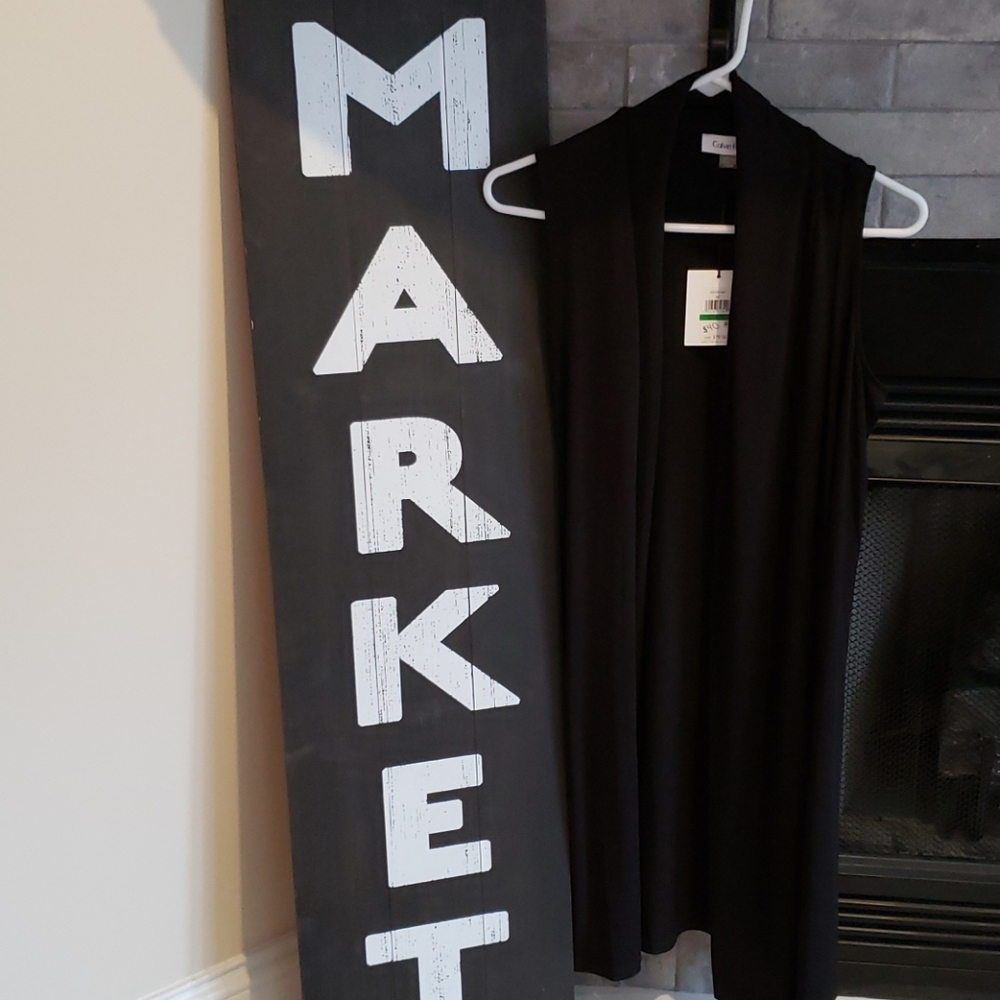 Long sleeveless vest